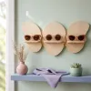 Woodstache et lunettes de soleil femme en bois : élégance naturelle et design mural au féminin